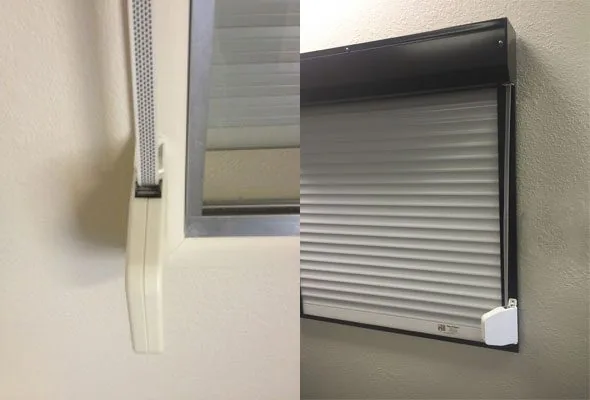 Hand-crank strap operator detail on a roll-down security shutter