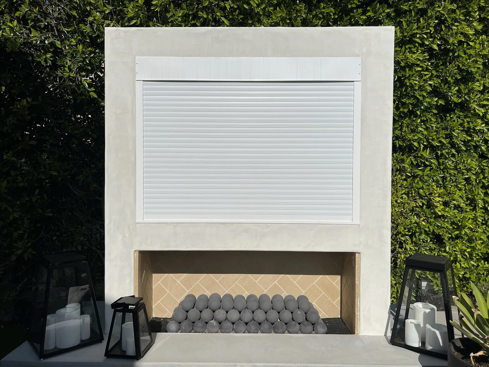 White rolling security shutter close-up, installed and closed