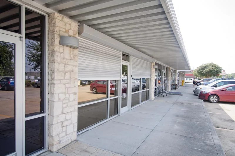 Rolling shutters protecting a retail storefront from break-ins