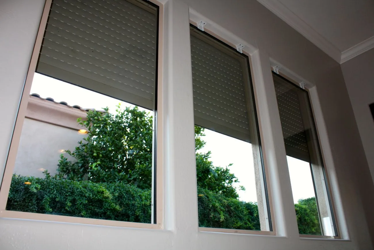 Home with shutters lowered for privacy
