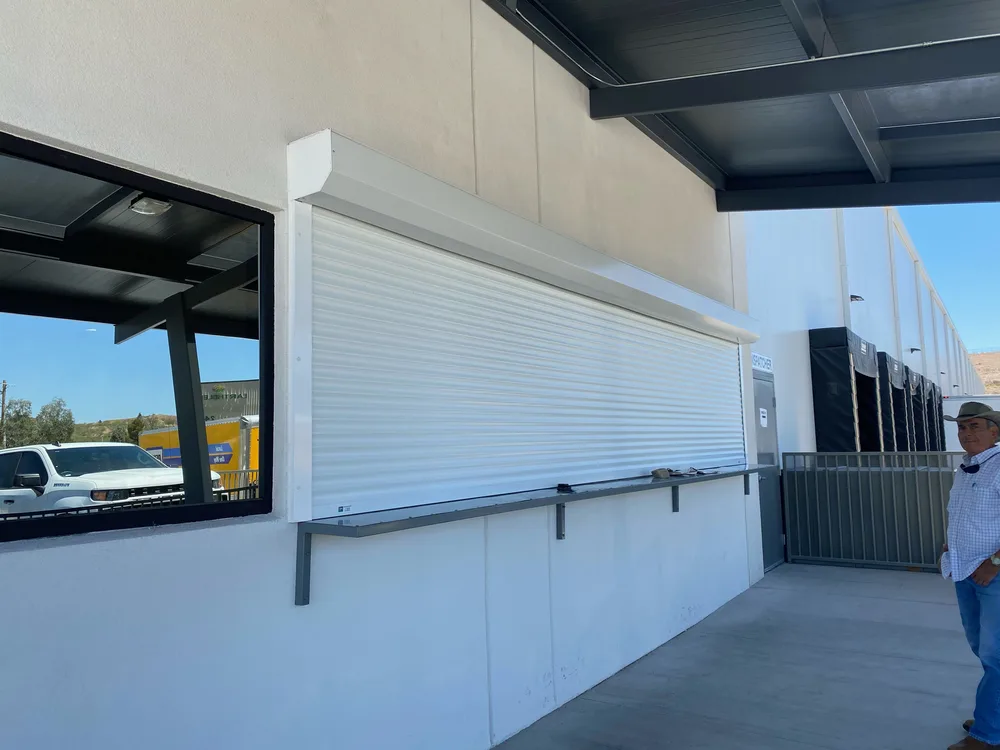 Rolling shutter over a commercial service counter