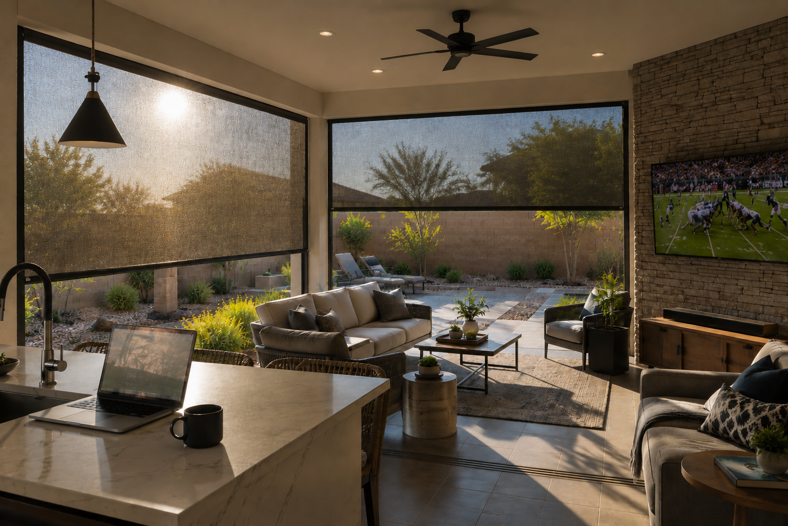 Rolling screen lowered over a covered patio at a Metro Phoenix home