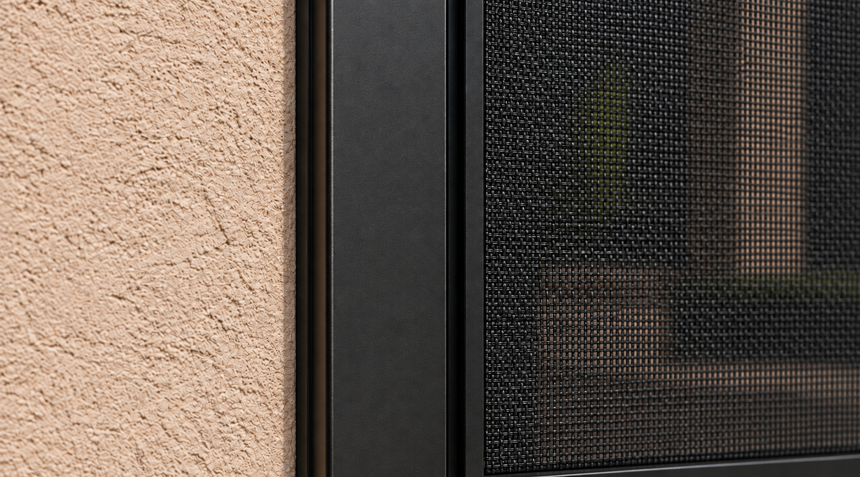 Zip side tracks holding a motorized rolling screen taut against monsoon wind